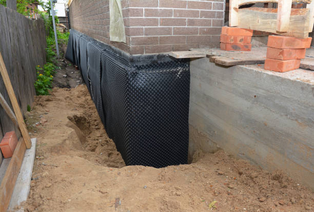SJ Waterproofing Pros technician performing targeted Waterproofing assessment in Glen Rock, PA